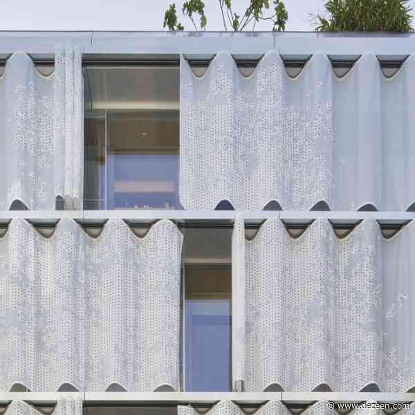 Moussafir Architectes retrofits 1970s Paris office with movable PVC curtains