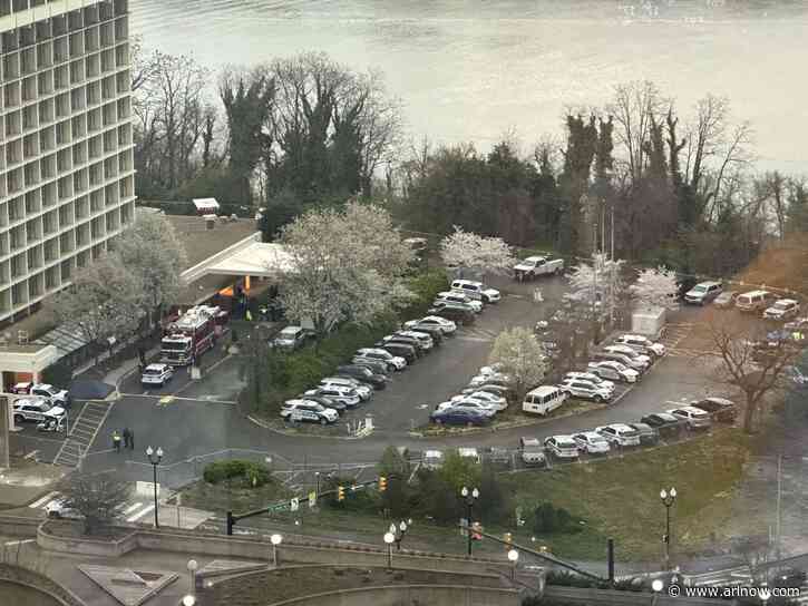 NEW: Massive police presence at former Key Bridge Marriott as county condemns building