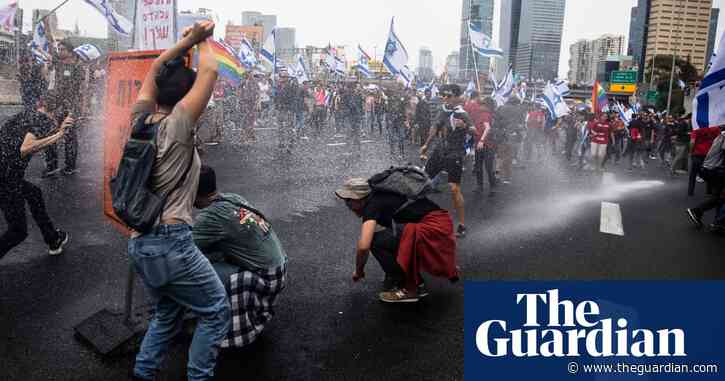 Scores arrested on Israeli day of protest as parliament passes judicial changes