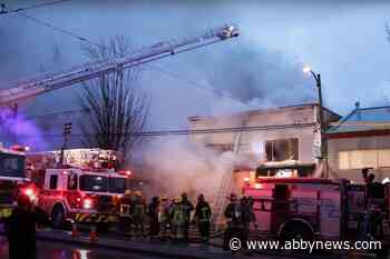 VIDEO: Fire burns through Vancouver cannabis shop, apartments