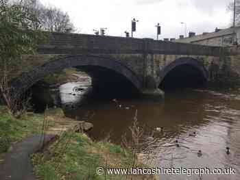 Man falls into River Calder and disappears downstream