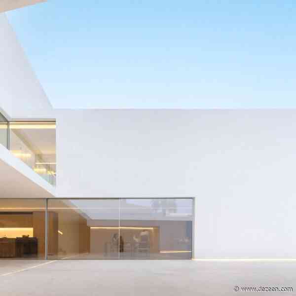 Fran Silvestre Arquitectos creates minimalist home behind historic facade in Spain