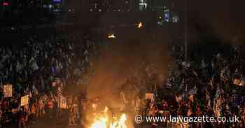 Israel to freeze judicial overhaul in face of protests