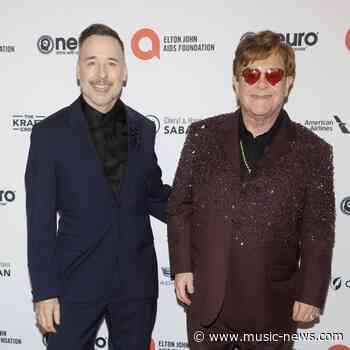 Sir Elton John walks six miles per week in his swimming pool