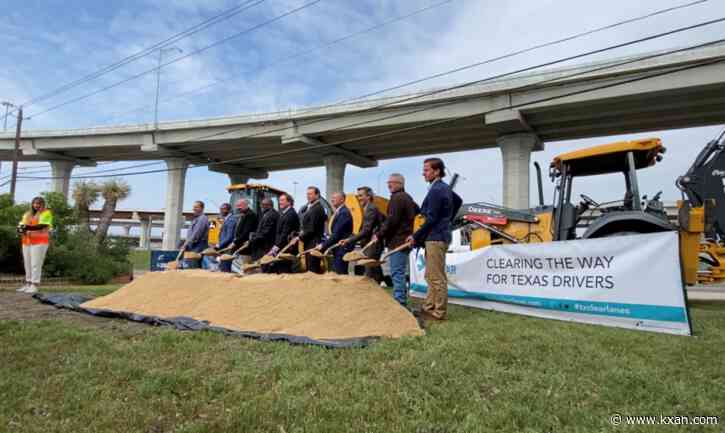 Protestors try to drown out the I-35 North construction groundbreaking