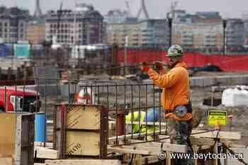US revises down last quarter's economic growth to 2.6% rate