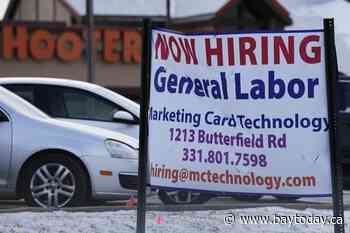 More Americans file for jobless claims; layoffs remain low