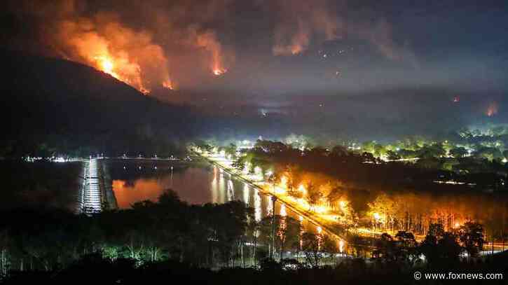 Thailand tries to contain overnight fire that engulfed 2 mountains