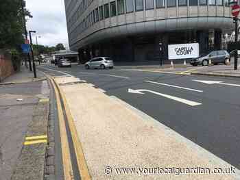 Brighton Road Croydon divided with poles for new cycle lane