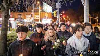 Hundreds take part in candlelight walk to honour teen fatally stabbed at Toronto subway station