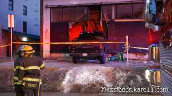 Truck crashes into Minneapolis building
