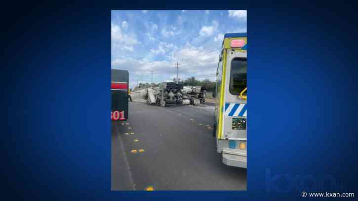 1 person seriously injured after cement truck rolls over in western Travis County