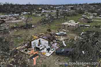 Tornado slams Little Rock, shreds rooftops, flips vehicles
