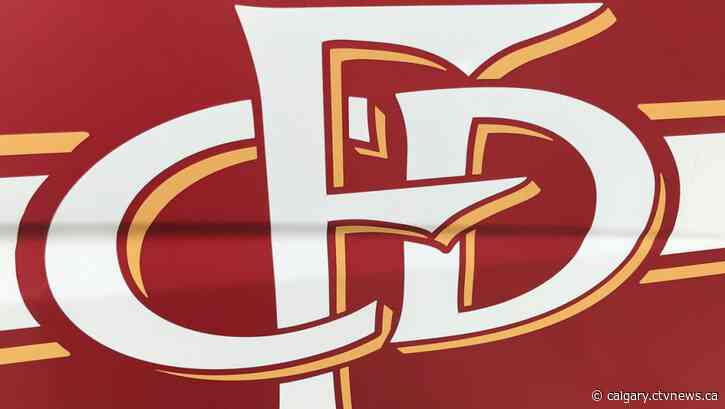 2 people, 2 dogs rescued by CFD after falling in Bow River