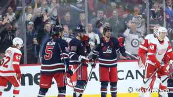 Jets score 6 straight goals to rout Red Wings for much-needed win