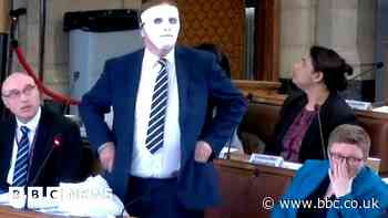 Local elections: Masked councillor issues photo ID warning