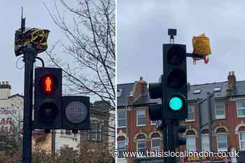 ULEZ cameras covered with plastic bags in Kingston