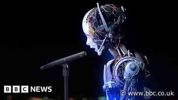 UK rules out new AI regulator