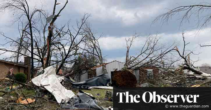 Monster storm system leaves at least 21 dead through US south and midwest