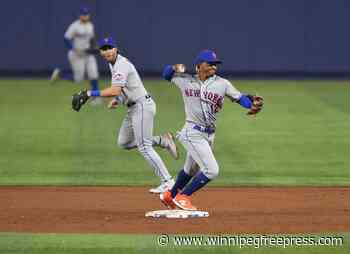 Mets’ wears ghost glove, fans 8, wins debut vs Marlins 5-1