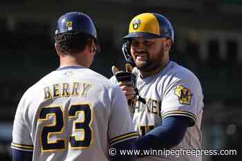 Winker drives in 3 as Brewers beat Taillon, Cubs 9-5