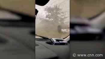 Man rides out tornado inside van. See the footage