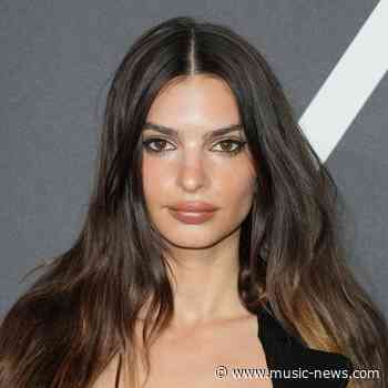 Emily Ratajkowski seemingly reveals she's been dating Harry Styles for two months