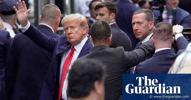 Trump surrenders in New York following hush money indictment