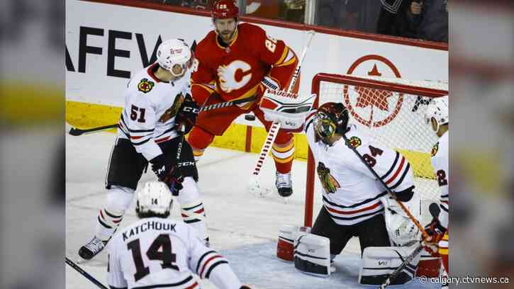 Chicago Blackhawks end eight-game losing skid by burning Calgary Flames 4-3