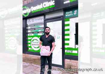 Smiles all round as Haslingden dentist celebrates a year in business