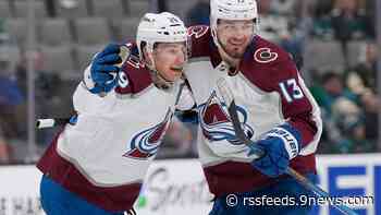 MacKinnon scores 2, leads Avalanche past Sharks 4-3 in OT