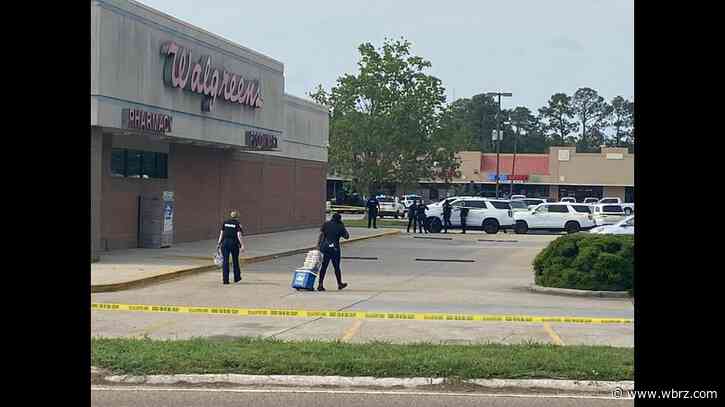 Police locked in standoff at shopping center along Florida Boulevard