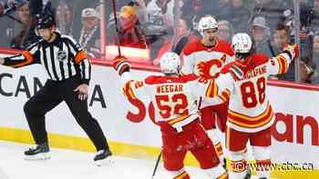 Mangiapane, Zadorov lead way as Flames defeat Jets to keep playoff hopes alive