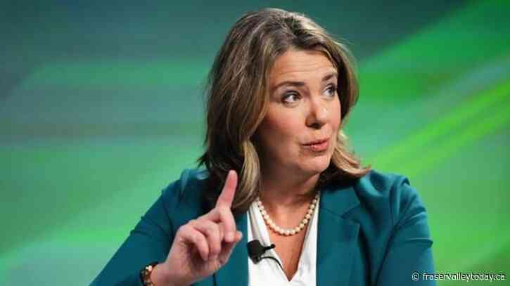 Alberta premier says politicians cannot talk to accused, but her call was OK