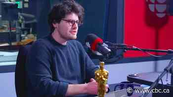 Putin critic Navalny got word of Oscar win in solitary confinement, Canadian director says