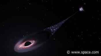 Runaway supermassive black hole is hurtling through space followed by tail of infant stars (video)