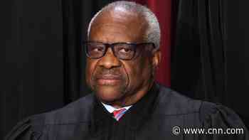 Justice Clarence Thomas says trips with billionaire didn't need to be disclosed at the time