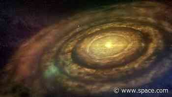 Dwarf star is surrounded by massive 'double ring' that hints at a Saturn-size exoplanet