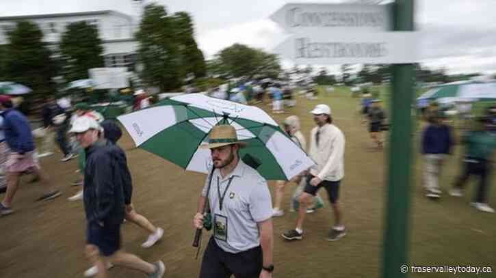 Storms bring down trees, bring play to halt at the Masters
