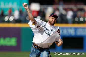 Chiefs' Kelce Throws Wild First Pitch Before Guards' Opener