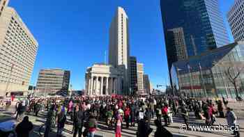 Hundreds chant 'we are not trash,' close Portage and Main in honour of woman found dead in Winnipeg landfill
