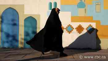 Iranian police to install cameras in public to identify, penalize unveiled women