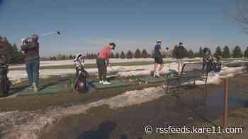 As spring weather arrives, golfers flock to driving range