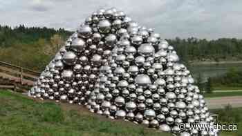 Man who became trapped inside Edmonton public art charged with mischief