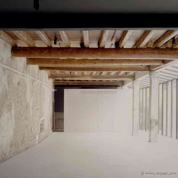 Concrete warehouse creates tactile backdrop for Italian art gallery by AMAA