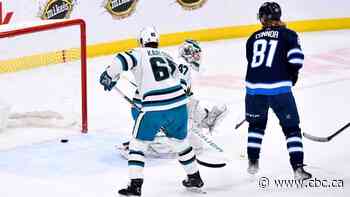 Jets move within 1 point of clinching playoff berth with victory over Sharks