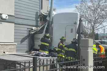 Driver, mother and baby safely extracted after semi crashes into Kelowna home