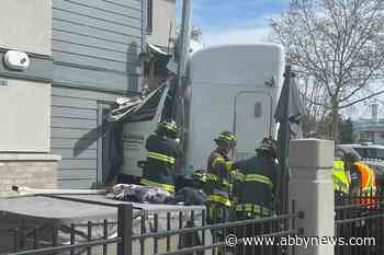 Driver, woman and baby safely extracted after semi crashes into Kelowna home