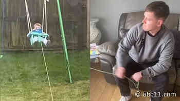 Dad rigs up rope to pull backyard swing set from comfort of couch