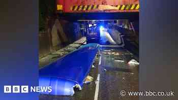 Double decker bus has roof ripped off in Eccles bridge crash